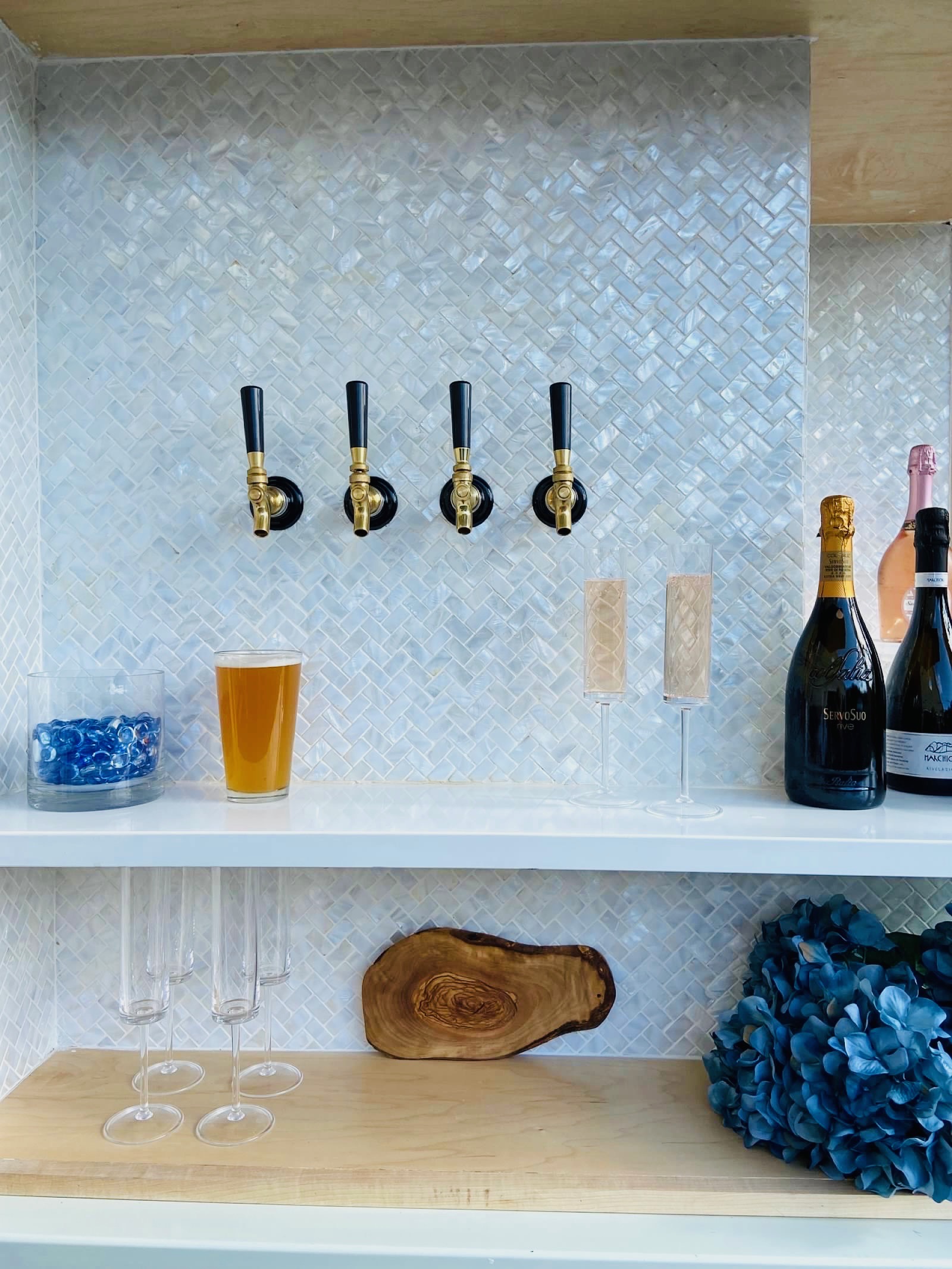 Gold tap handles with floral detail